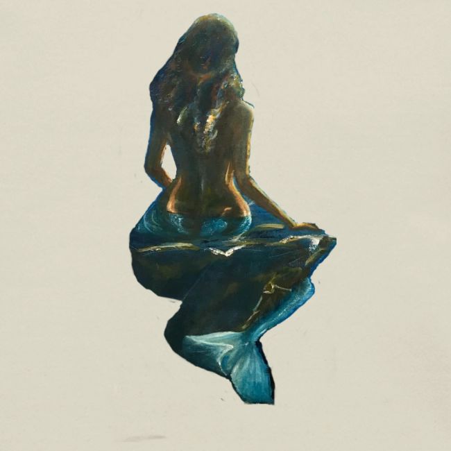 Midnight Mermaid on a rock