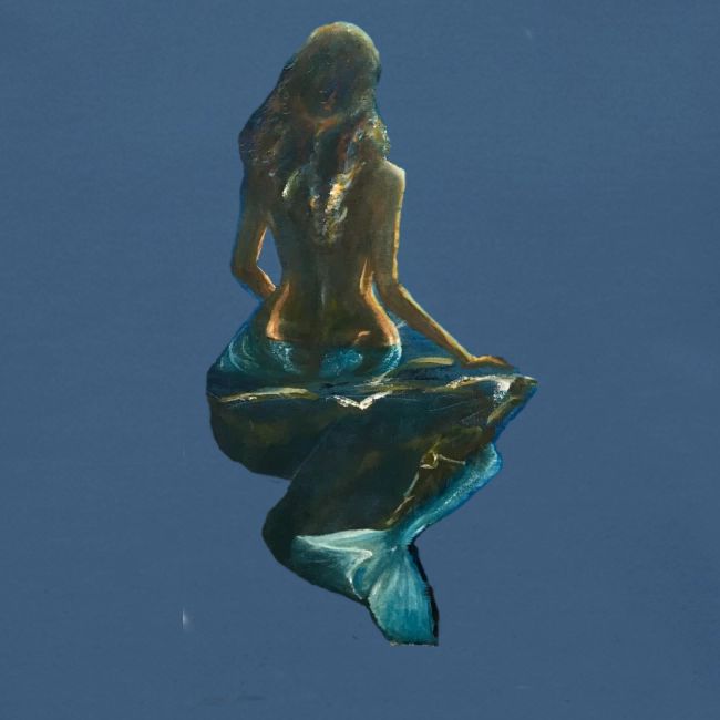 Midnight Mermaid on a rock