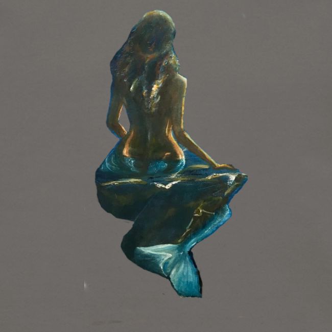 Midnight Mermaid on a rock