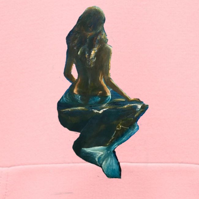 Midnight Mermaid on a rock