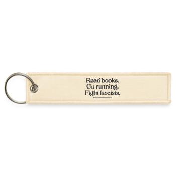 Read Books Run Fight Fascists - Jet Tag Keychain - creme - Front