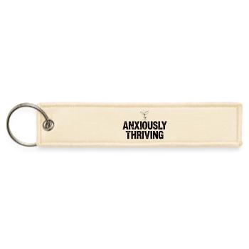 Anxious Yum Glitter - Jet Tag Keychain - creme - Front