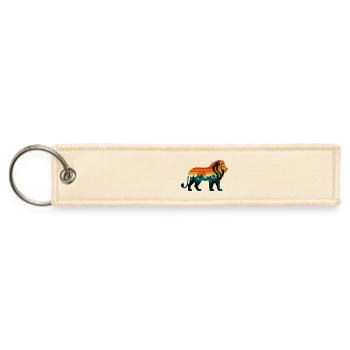 Lion silhouette over mountain sunset - Jet Tag Keychain - creme - Front