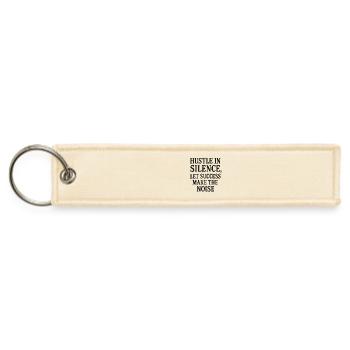 "Hustle in silence, let success make the noise" - Jet Tag Keychain - creme - Front