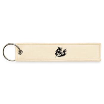 Dynamic Off-road Dirt Bike Scene In The Mud - Jet Tag Keychain - creme - Front