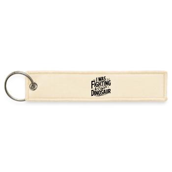 I Was Fighting a Dinosaur - Jet Tag Keychain - creme - Front