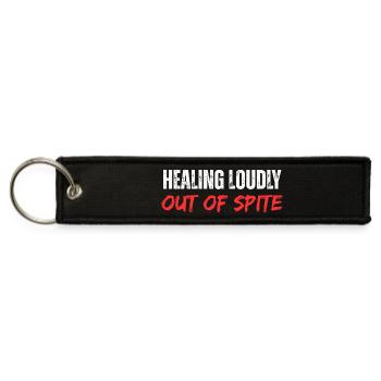 Healing Loudly OutOfSpite - Jet Tag Keychain - black - Front
