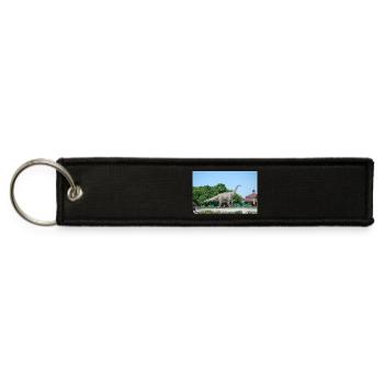 Dinosaur Statue in Park Setting - Jet Tag Keychain - black - Front