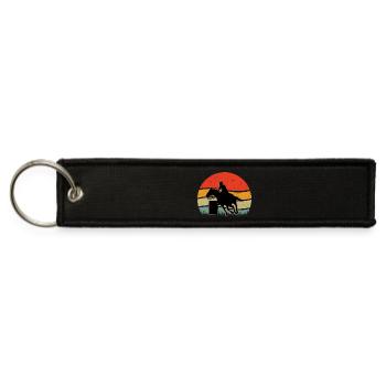 Silhouette of a Child Riding a Horse at Sunset - Jet Tag Keychain - black - Front