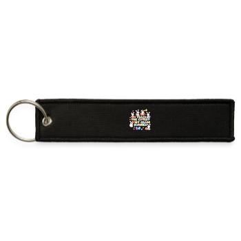 I Teach The Cutest 1st Grade Bunnies Easter - Jet Tag Keychain - black - Front