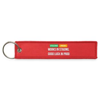 Works In Staging Good Luck In Prod Dev T-Shirt - Jet Tag Keychain - red - Front