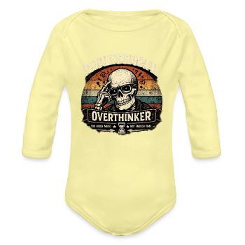 Professional Overthinker Skull Retro Badge - Organic Long Sleeve Baby Bodysuit - washed yellow - Front