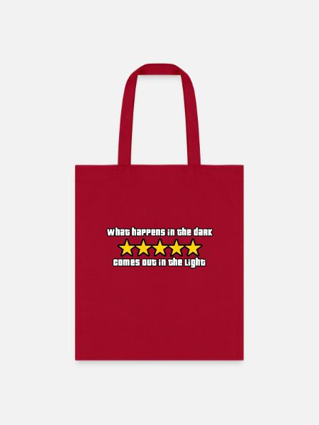 what happens in the dark comes out in the light - Tote Bag - red