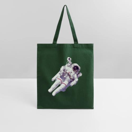 Astronaut floating in space. - Tote Bag